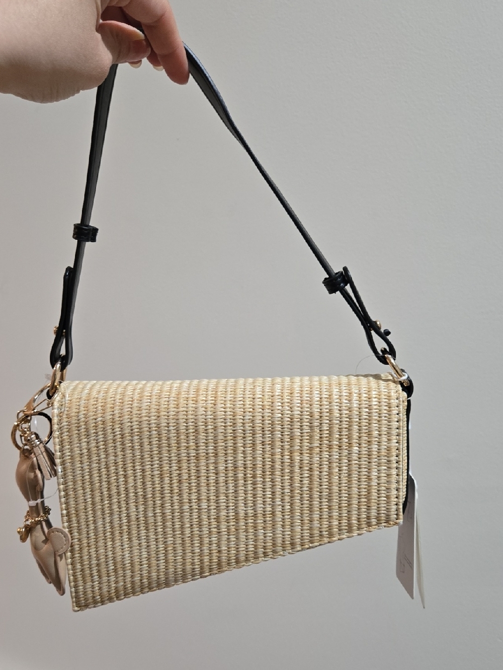 Urban Expressions Cream Straw Crossbody with Black Adjustable Strap and Charm